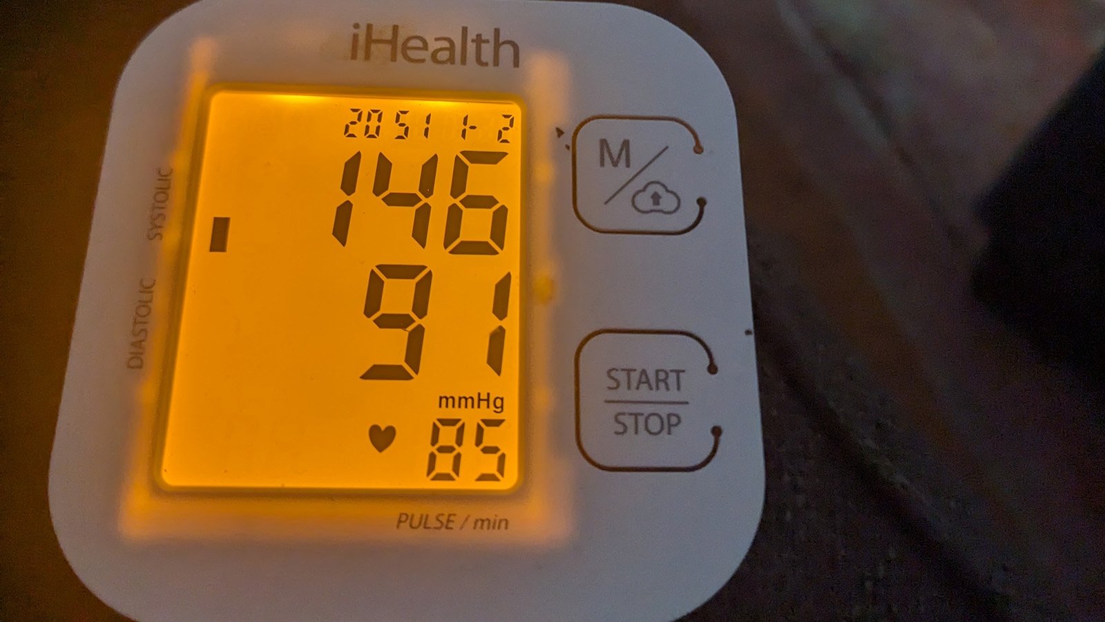 Digital readout of blood pressure display showing 146 over 91